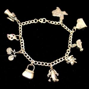 Sterling Silver Charm Bracelet and Nine Sterling Charms
